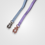 Baby blue and lilac nylon dog leashes displayed on a light gray background.