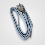 Baby blue nylon dog leash with metal clip displayed on a light gray background.