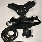 Black Heavy Duty harness, matching nylon leash, and portable poop bag dispenser set displayed on a white background.