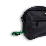 Black Bully Wags crossbody dog walking bag with a green poop bag attached, displayed on a white background.