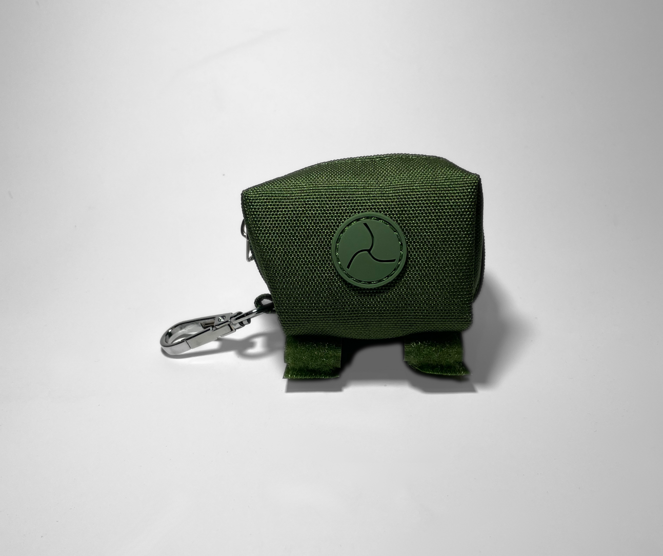 Cactus green portable poop bag dispenser shown from the side, displayed on a white background.