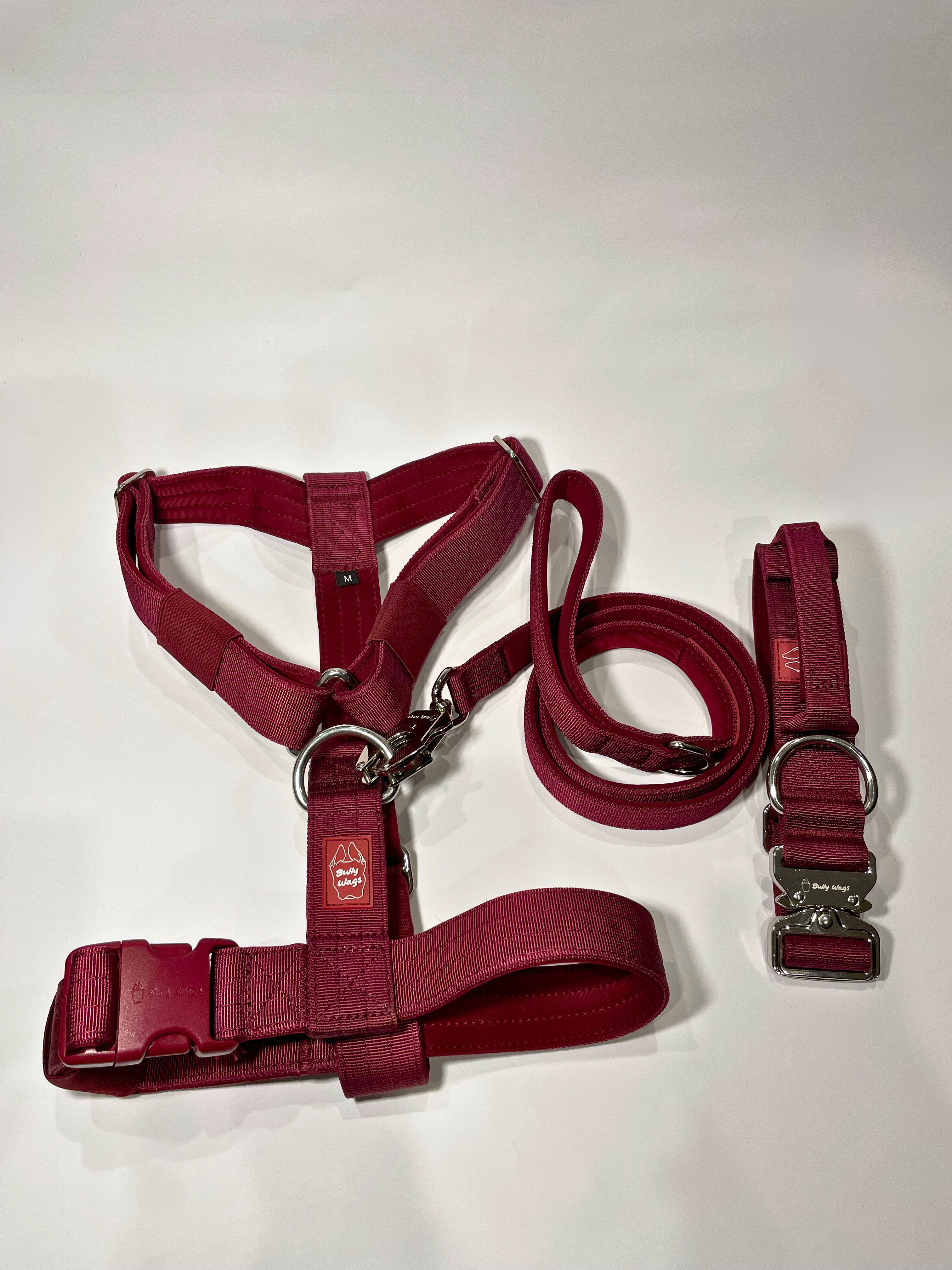 Cherry wine Y-strap dog harness, matching dog collar, and matching nylon leash set displayed on a white background.
