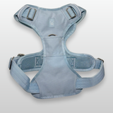 Baby Blue Heavy Duty dog harness shown from the front, featuring silver hardware, breathable mesh padding, adjustable straps, and reflective trim on a light gray background.
