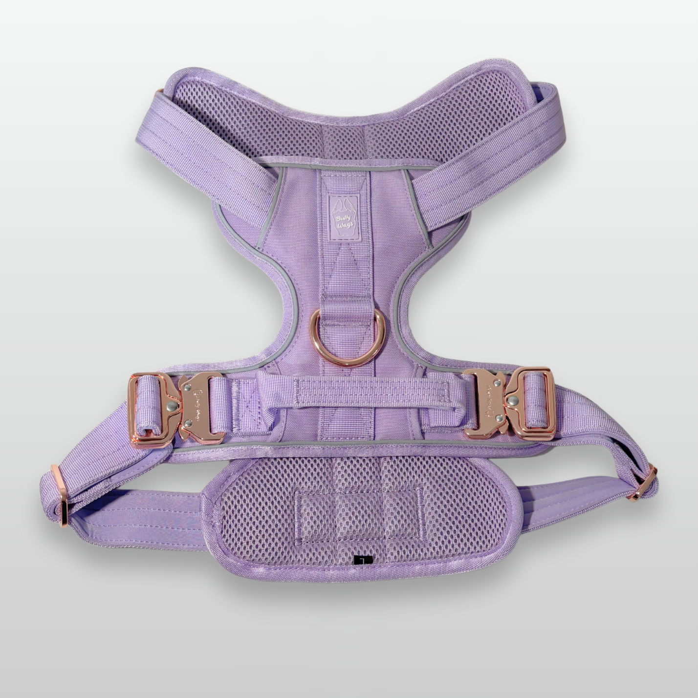Lilac Heavy Duty dog harness shown from above, featuring rose gold hardware, breathable mesh padding, adjustable straps, and reflective trim on a light gray background.
