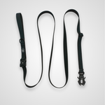 Multi-way hands-free dog leash with metal hardware displayed on a white background.